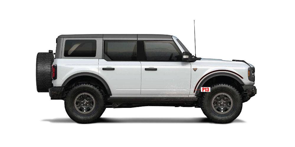 White Bronco 4D with labeled front wheel arch replacement part P13. Engineered for durability and off-road use.